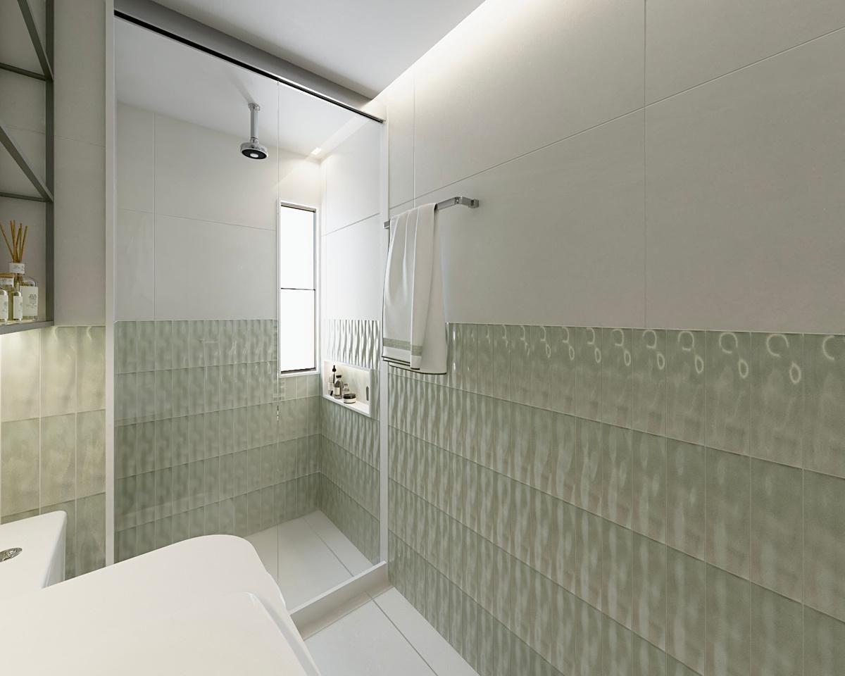 Banho com revestimento verde e nichos